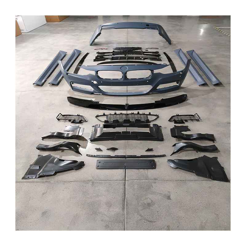 BMW F30 M-Tech kit laid out on warehouse floor