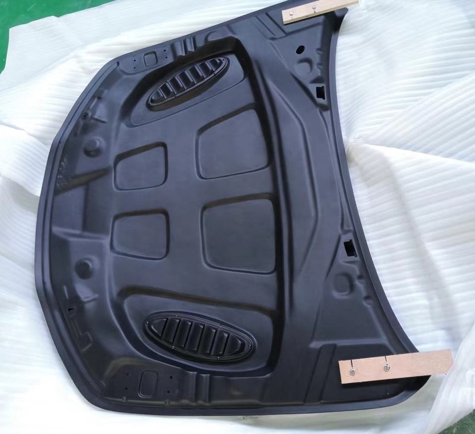 Underside of Giulia carbon hood showing vent structure