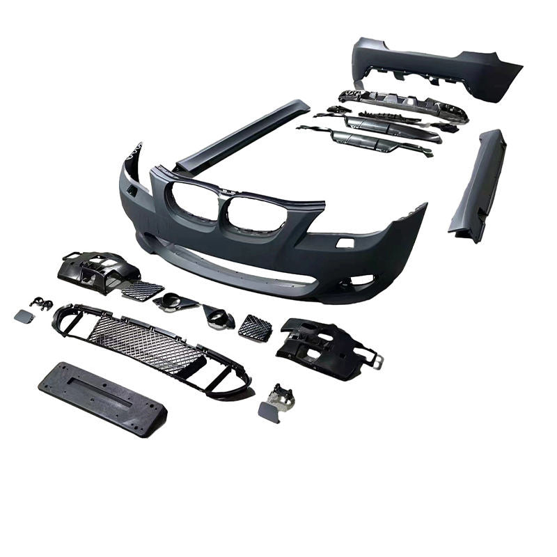 BMW E60 M-Tech full body kit — front and rear bumpers, side skirts and trim laid out