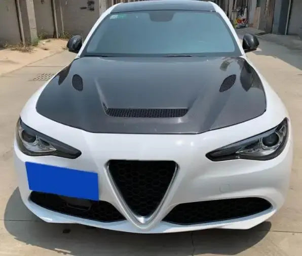 Carbon vented hood installed on white Alfa Romeo Giulia