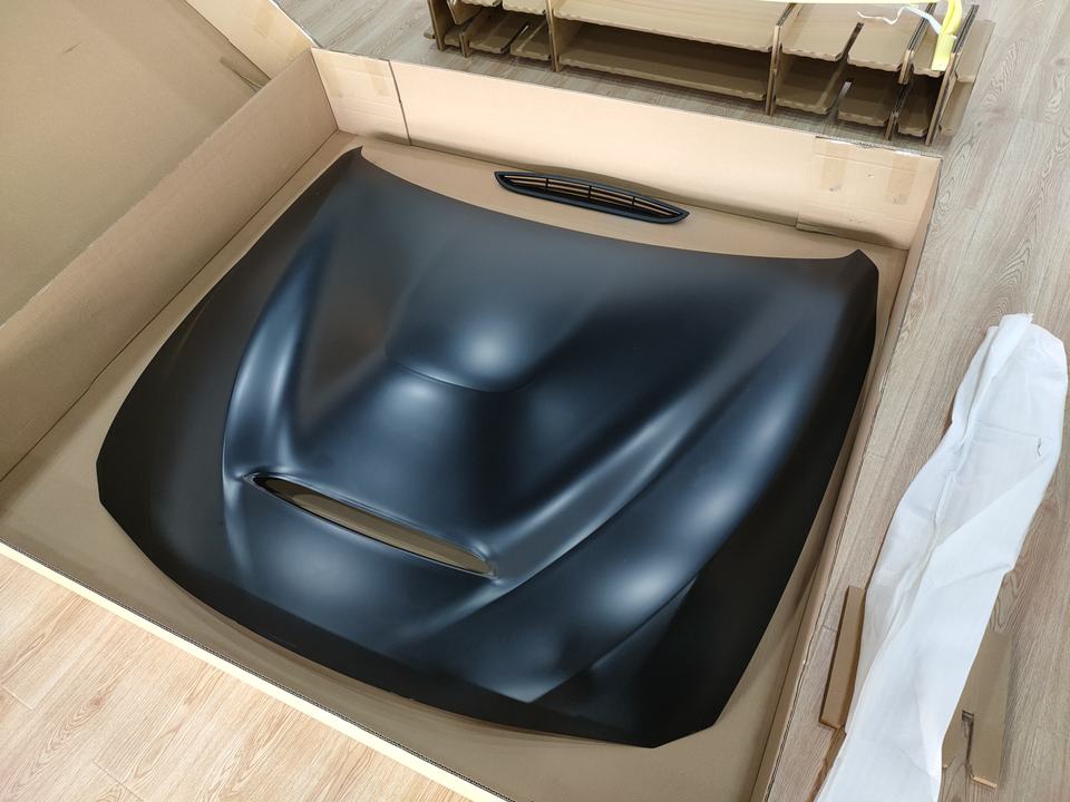 F30 GTS-style hood packed in shipping crate