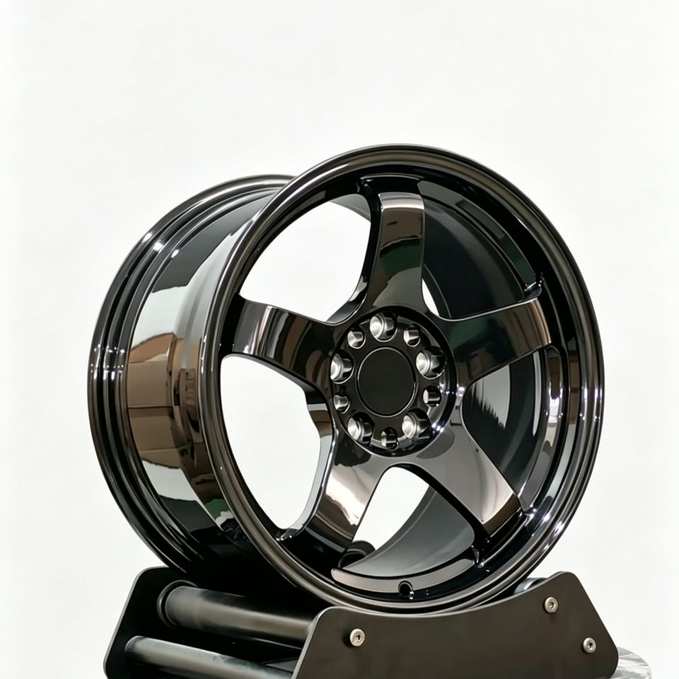 TE37-style forged wheel in gloss black, front view